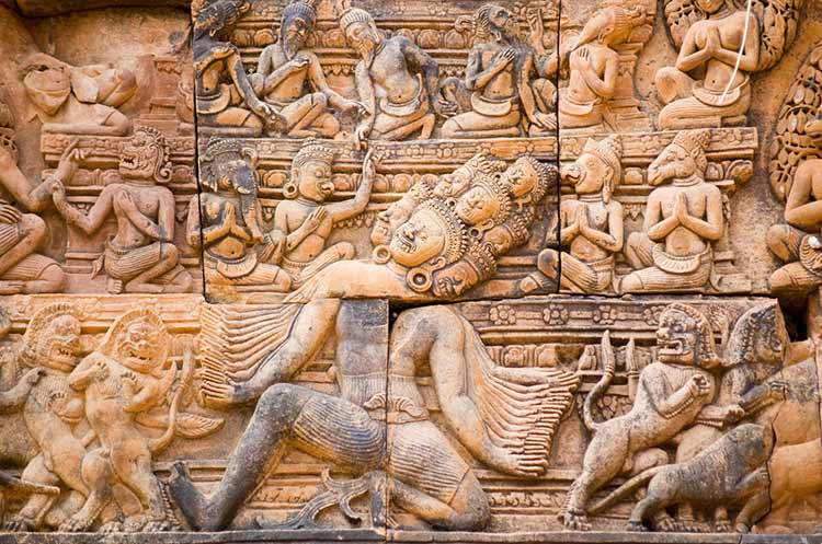 Carvings of Hindu deities on the walls of the Banteay Srei