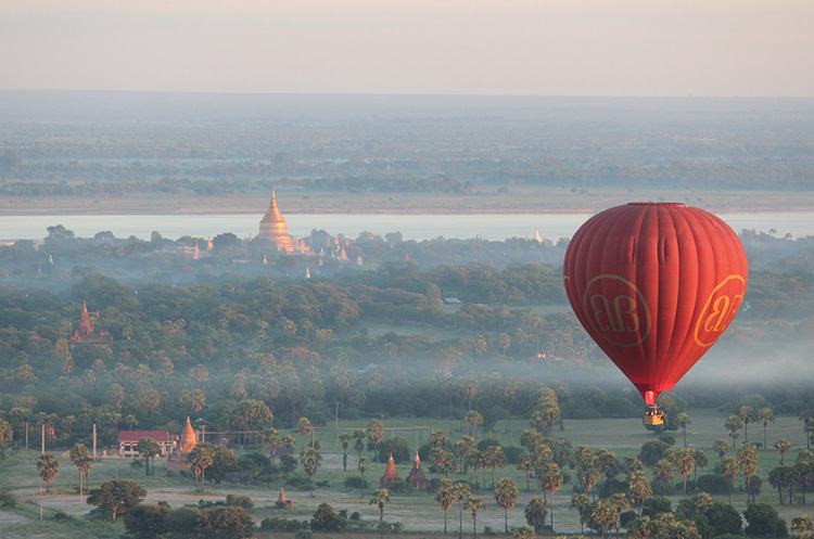 Hot air balloon over the plains of Bagan with good views of the old temples