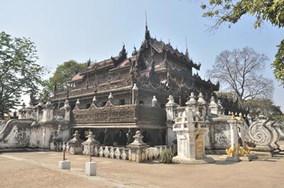 The finely carved teak wood Shwenandaw monastery, a good example of traditional 19th wooden monastery architecture