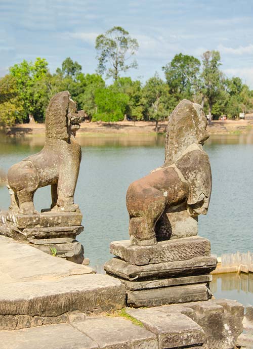 Two lions at the embarkation terrace of the Srah Srang in Angkor