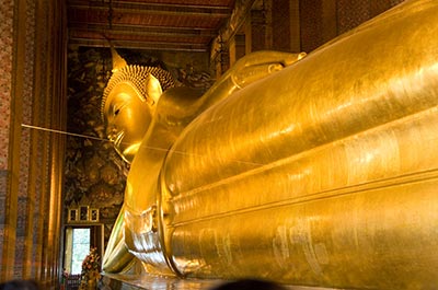 The 46 meter long gold plated Reclining Buddha image at the Wat Pho in Bangkok