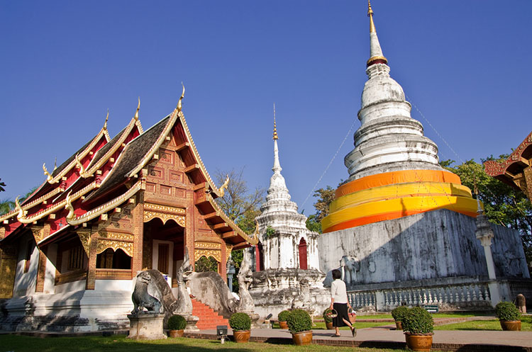 The Lanna style Viharn Lai Kham and two chedis at Wat Phra Singh temple in Chiang Mai
