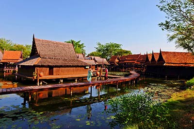 Traditional wooden houses on stilts and a wooden walkway