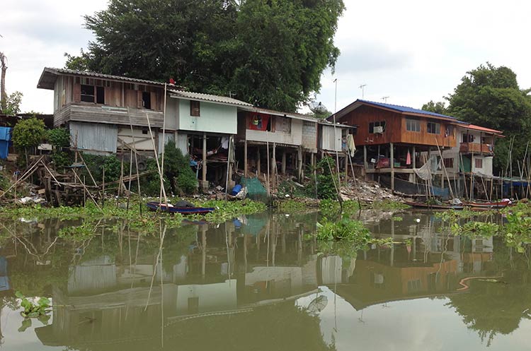 Wooden houses on stilts on the banks of the river