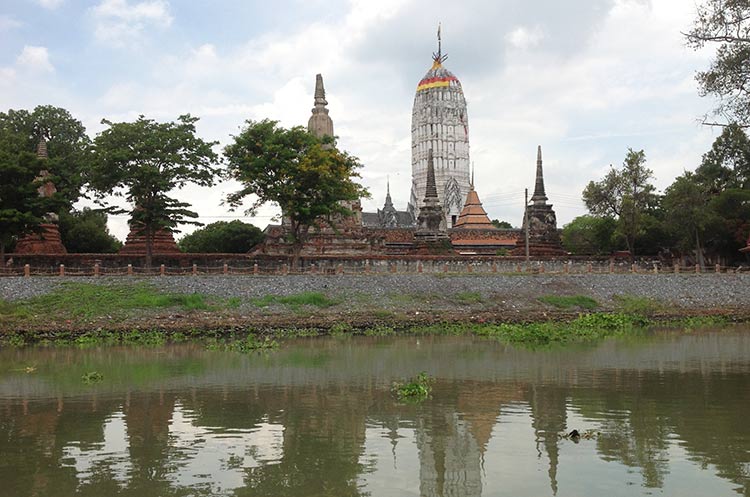 The Khmer style prang at Wat Phutthaisawan seen from the river