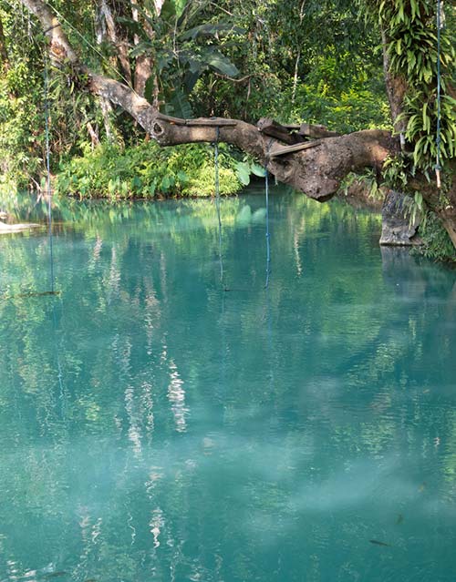 Crystal waters of the Blue Lagoon near Vang Vieng