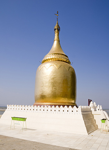 The Bupaya pagoda standing on the bank of the Irrawaddy river