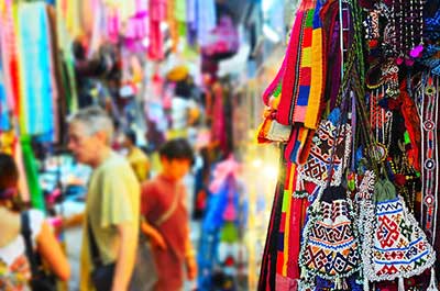 Stalls and shoppers at Chatuchak weekend market