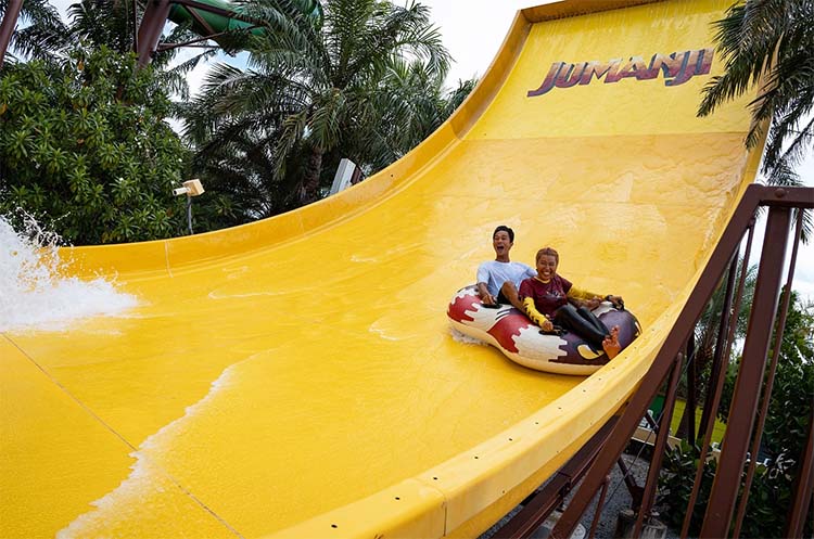 Two people in a raft on the Jaguar Mountain water slide