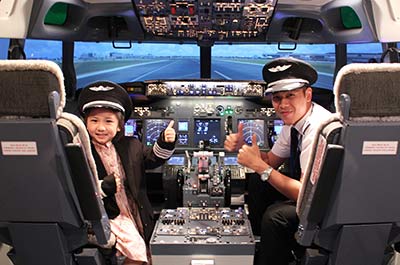 In the cockpit of a Boeing 737 flight simulator at Flight Experience