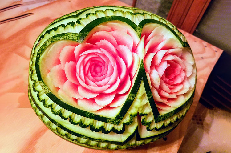A carved watermelon used to decorate the dinner table