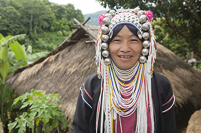 A woman of a hills tribe dressed in traditional clothing in Chiang Mai