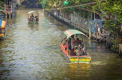 A boat carrying tourists on the canals