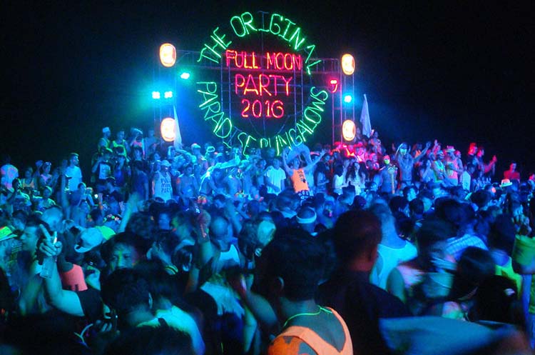 People enjoying a full moon party on Koh Phangan