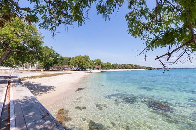 Sandy beach and clear waters at Koh Si Chang island