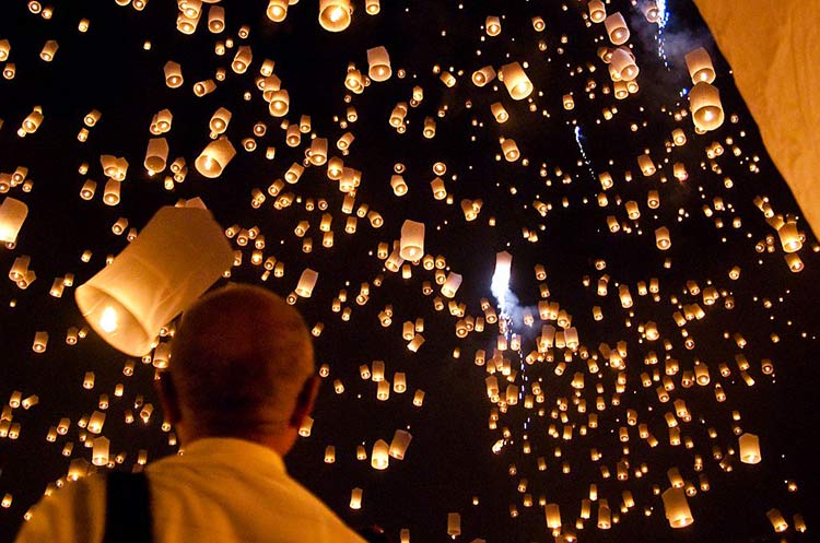 Thousands of floating lanterns illuminating the sky