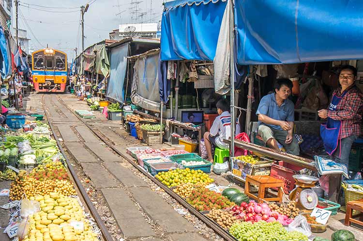Fresh fruits and vegetables at the market around the railway track