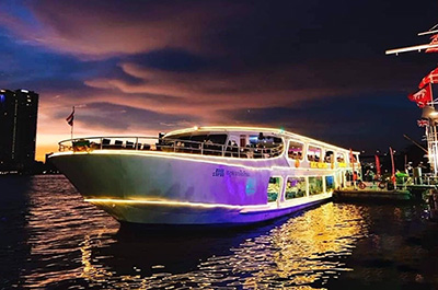 The Meridian dinner cruise ship at dusk