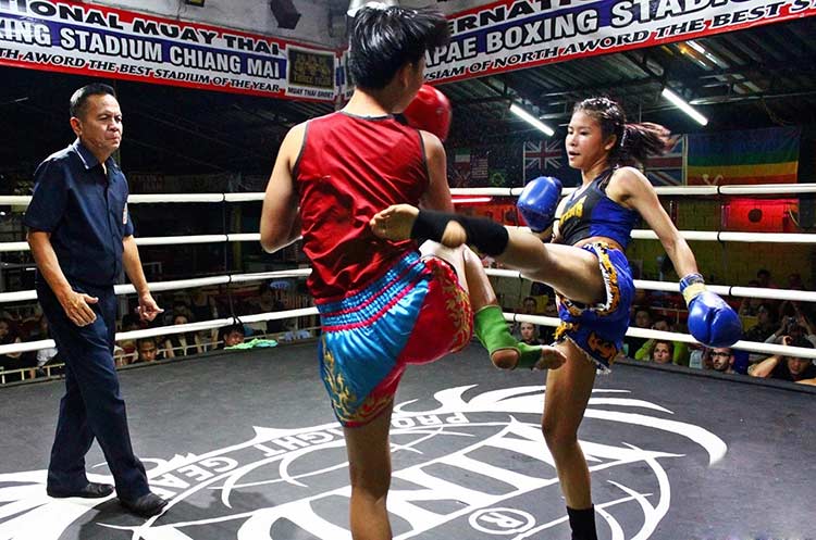 Female Muay Thai fighters in action