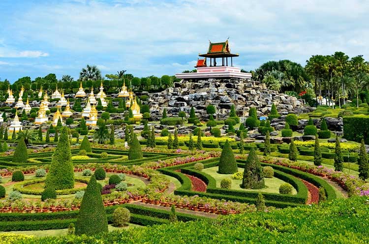 Manicured gardens with many kinds of plants and flowers at Nong Nooch tropical garden