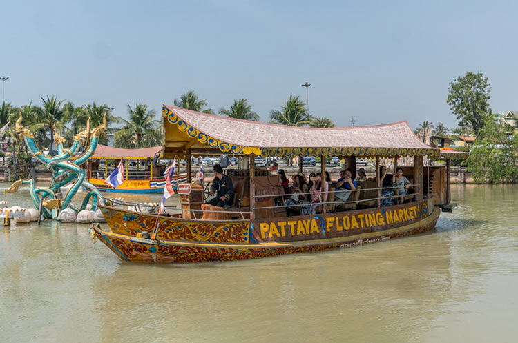 Amphibious boat ride across the floating market canals