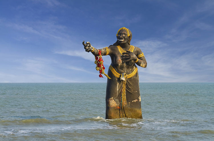 Statue of a female character from a Thai epic in the sea at Puek Tian beach