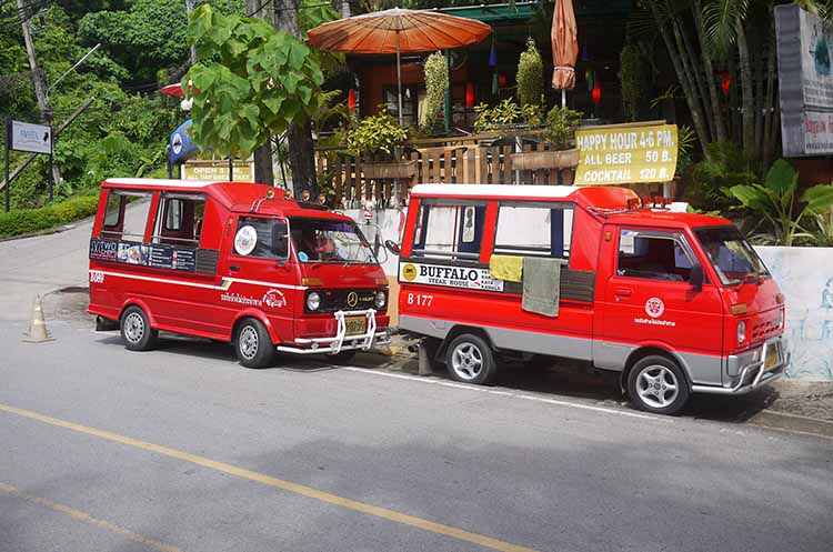 Two tuk tuks waiting for passengers in Phuket