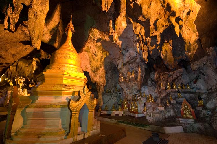 A pagoda and Buddha images in the cave