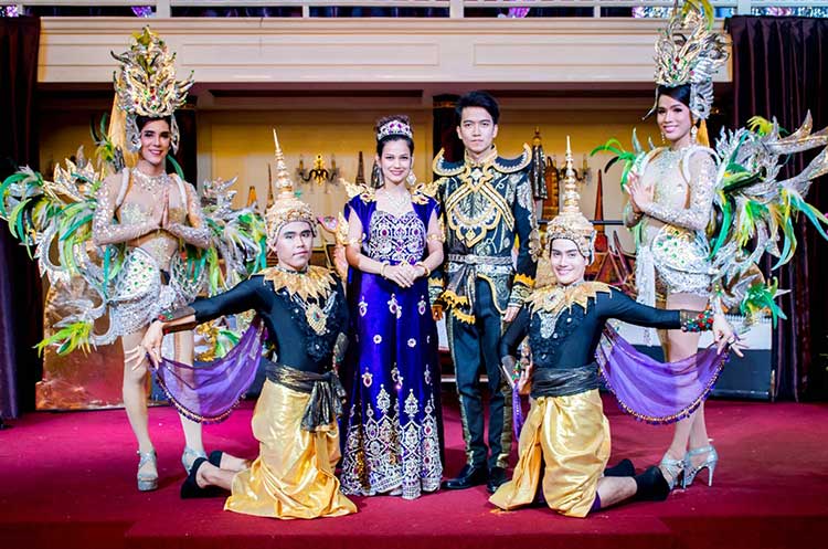 Elegant dancers in a Thai act