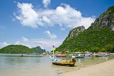 Small fishing boats in a bay in Prachuap Khiri Khan