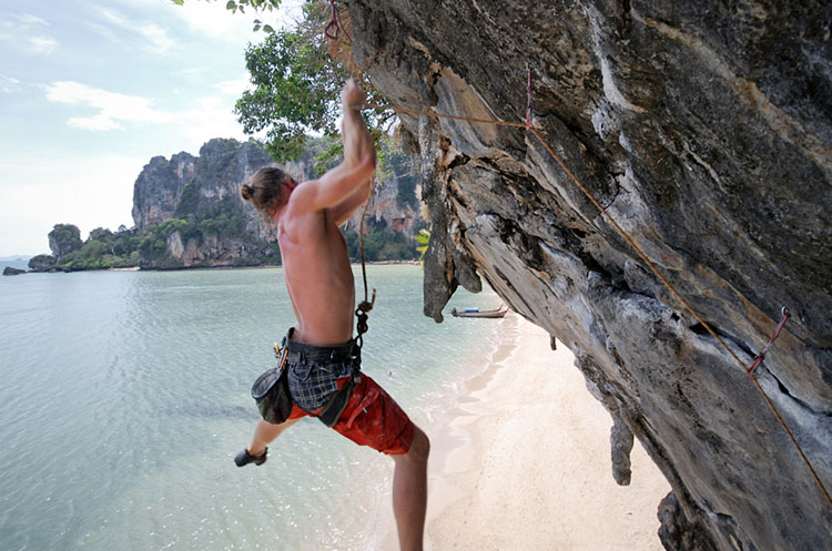 Rock climbing the limestone mountains in Krabi