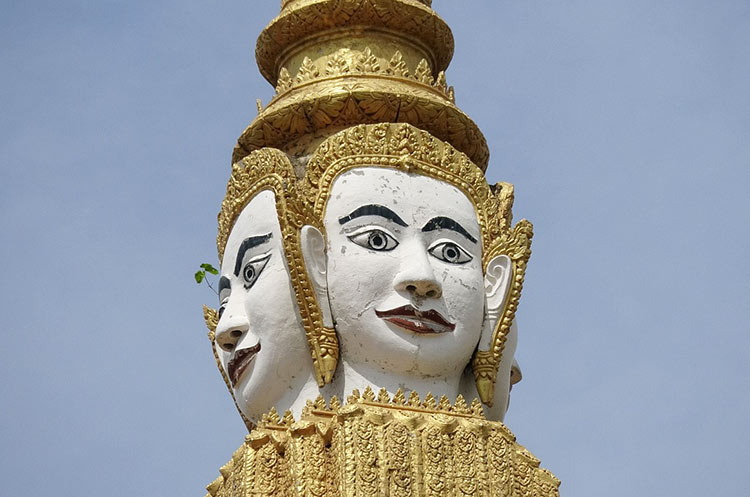 The four faced head of Brahma on top of the central spire of the Throne Hall