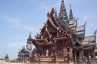 The exterior of the Sanctuary of Truth adorned with ornate wood carvings