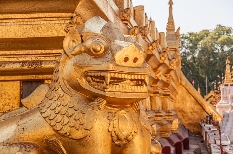 Detail of a lion guarding the pagoda