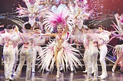 Dancers wearing extravagant outfits at the Simon Cabaret Show in Phuket
