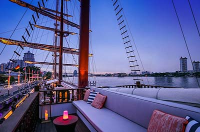 The bridge viewpoint on the Sirimahannop, a three master sailing ship turned into a restaurant