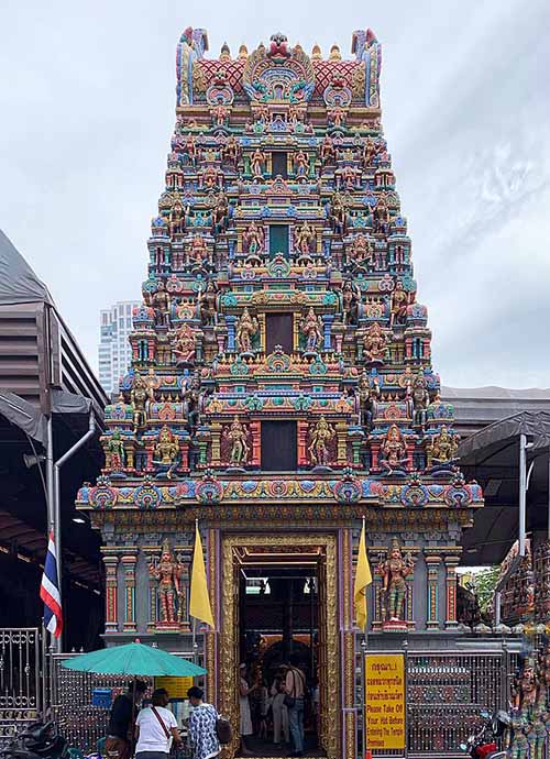 The Sri Maha Mariamman gopura entrance gate adorned with carved depictions of Hindu deities
