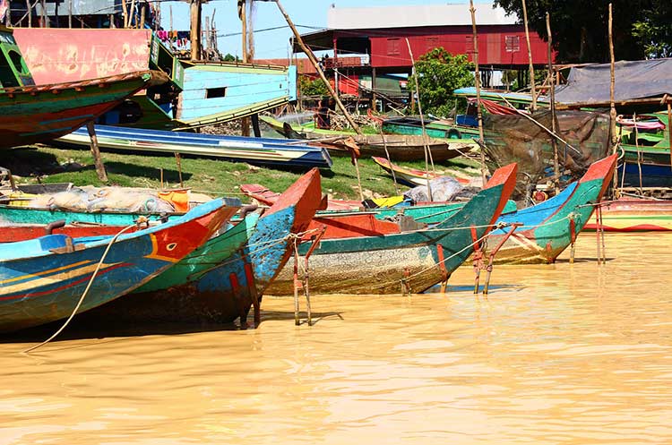 Boats in the water at one of the villages on Tonlé Sap lake