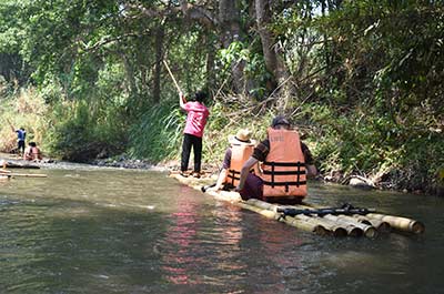 Bamboo rafting down a river in Chiang Mai