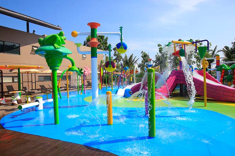 Small water slides, water jets and sprinklers at Wonderland, an area for the youngest children