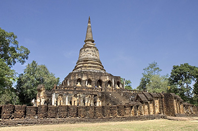 The Singhalese style bell shaped chedi of the Wat Chang Lom in Si Satchanalai Historical Park