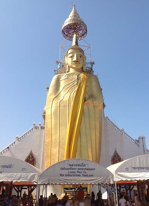 The 32 meter tall standing Buddha at Wat Intharawihan in Bangkok