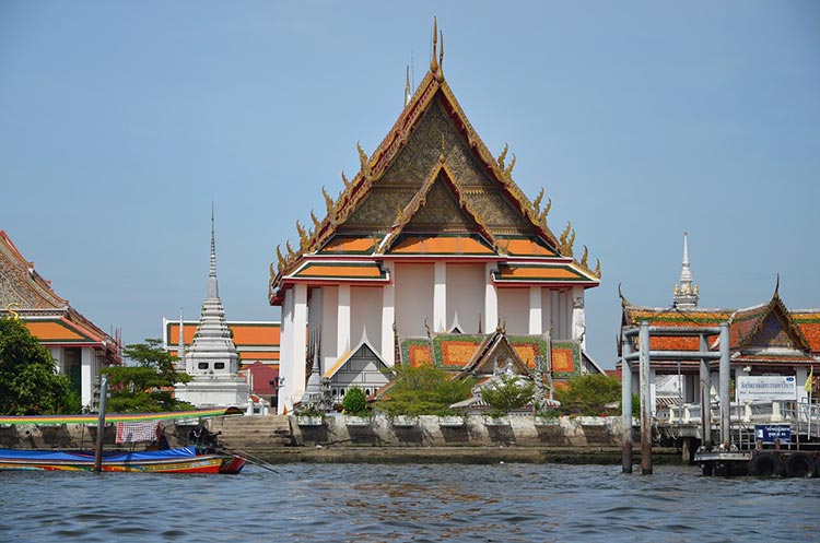 Wat Kalayanamit standing on the banks of the Chao Phraya river in Bangkok