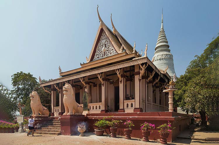 Wat Phnom hilltop temple in Phnom Penh guarded by a pair of lions