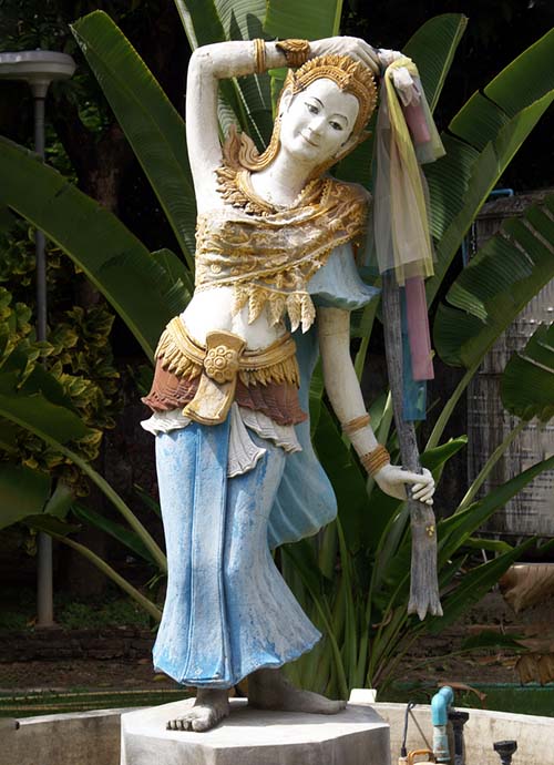 A statue of Phra Mae Thorani at the Wat Phra Kaew Don Tao