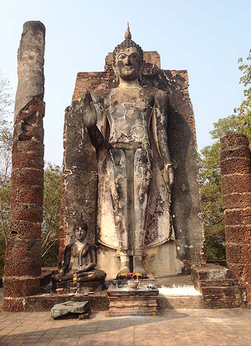 The 12 meter tall Phra Attharot standing Buddha